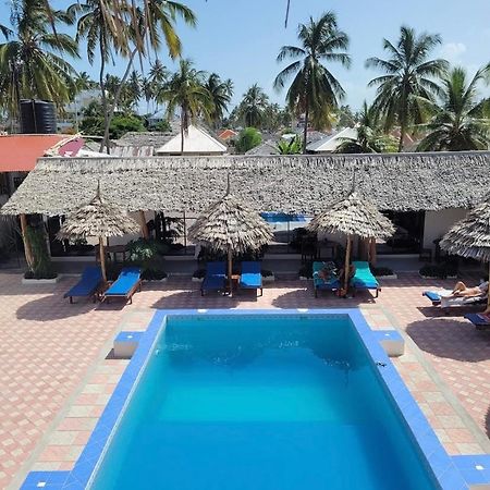 Amani Hotel Паже Екстериор снимка