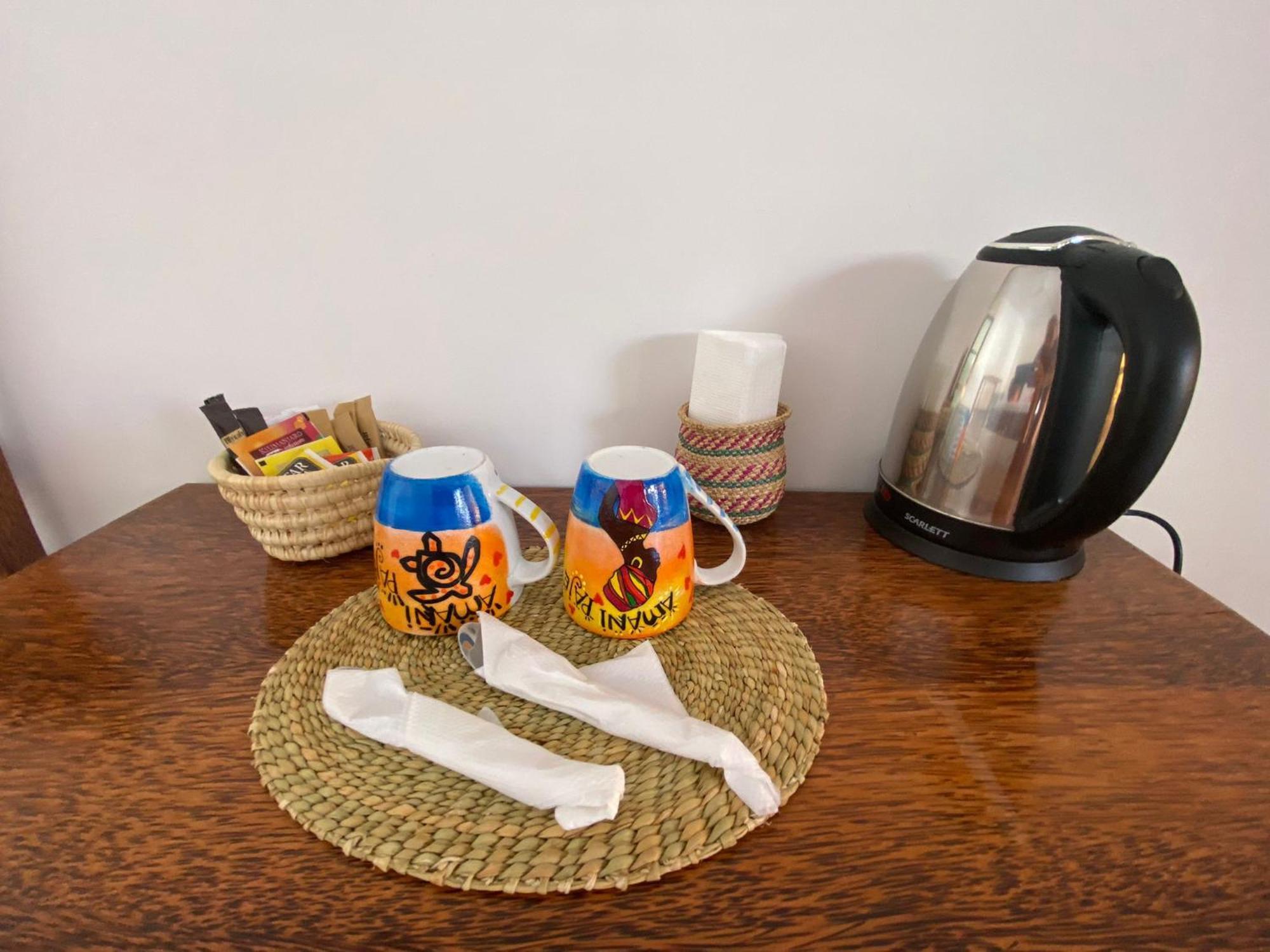 Amani Hotel Паже Екстериор снимка