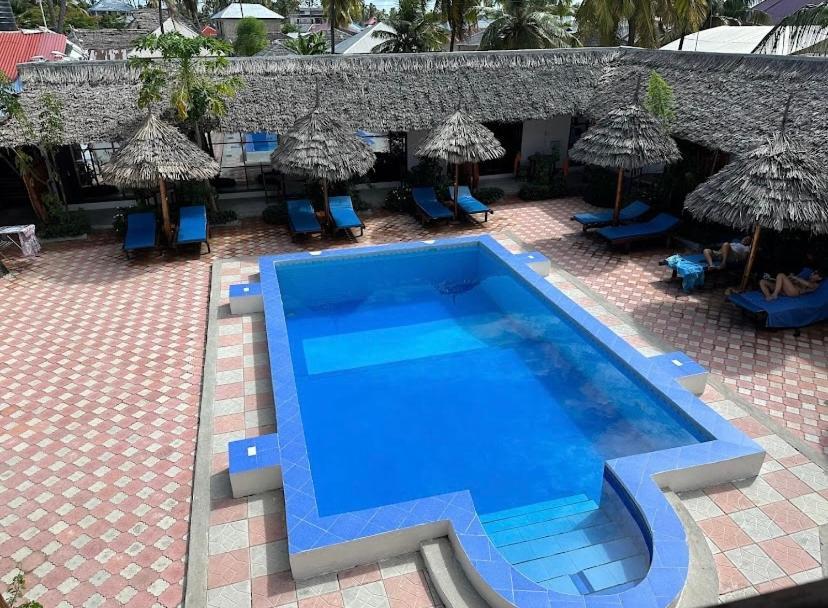 Amani Hotel Паже Екстериор снимка